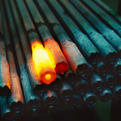 close-up of red hot iron beams