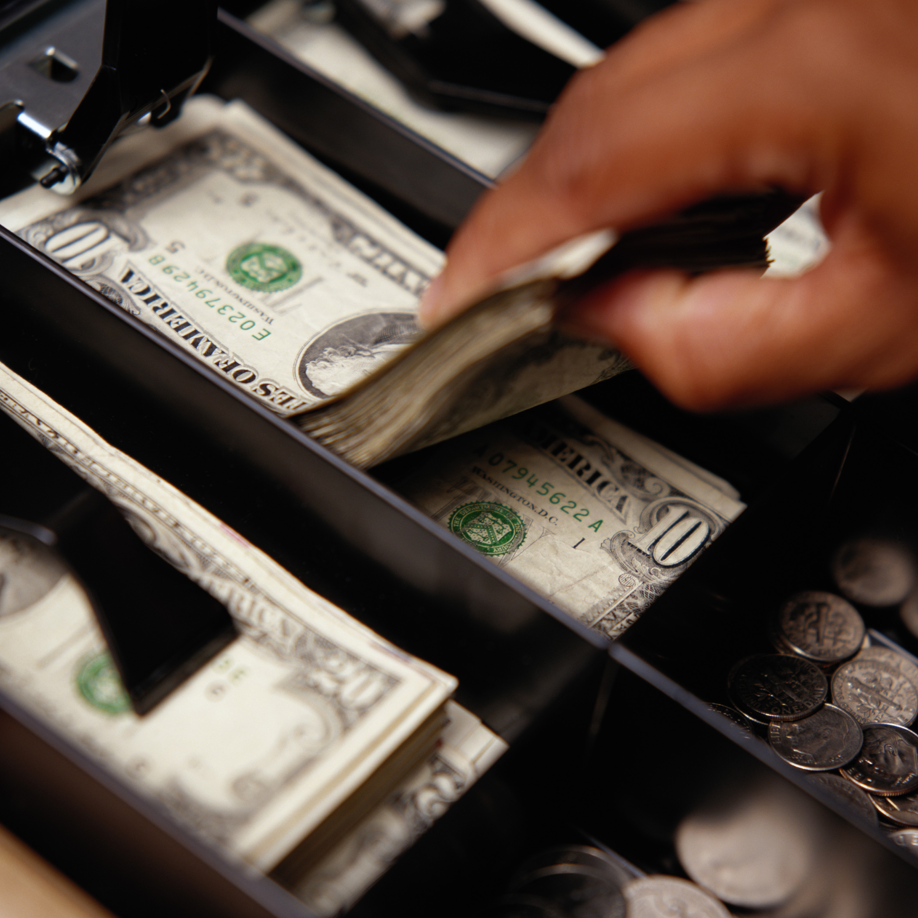 Close-up of Ten Dollar Bills in Cash Register Till