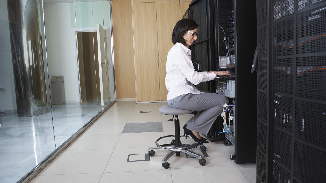 Technician Working in Server Room