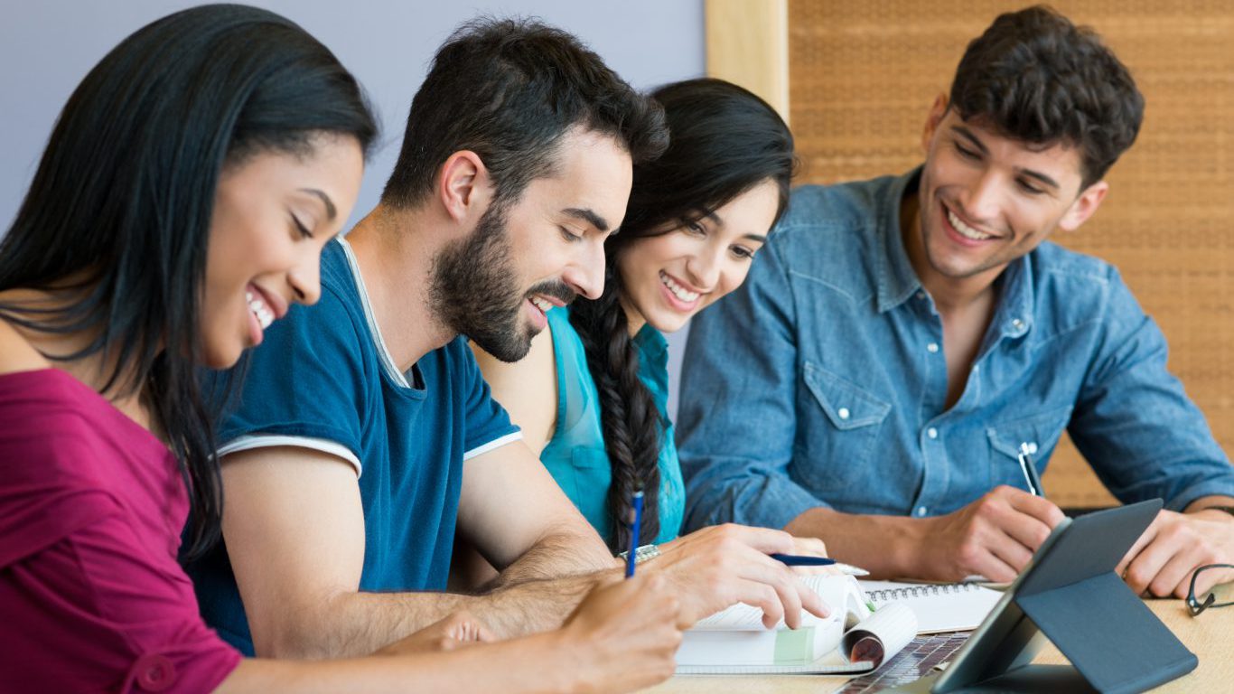 Happy student studying together