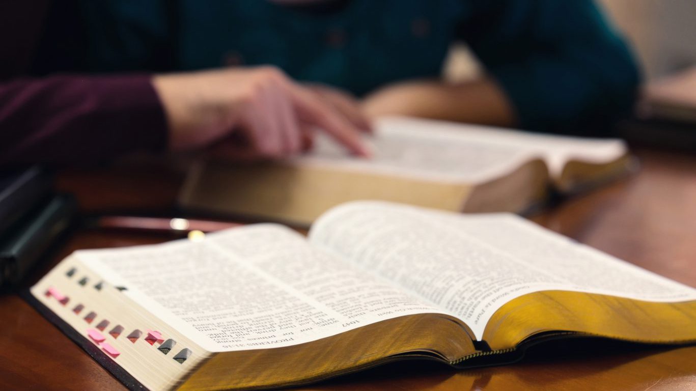 Young Couple Studying The Bible