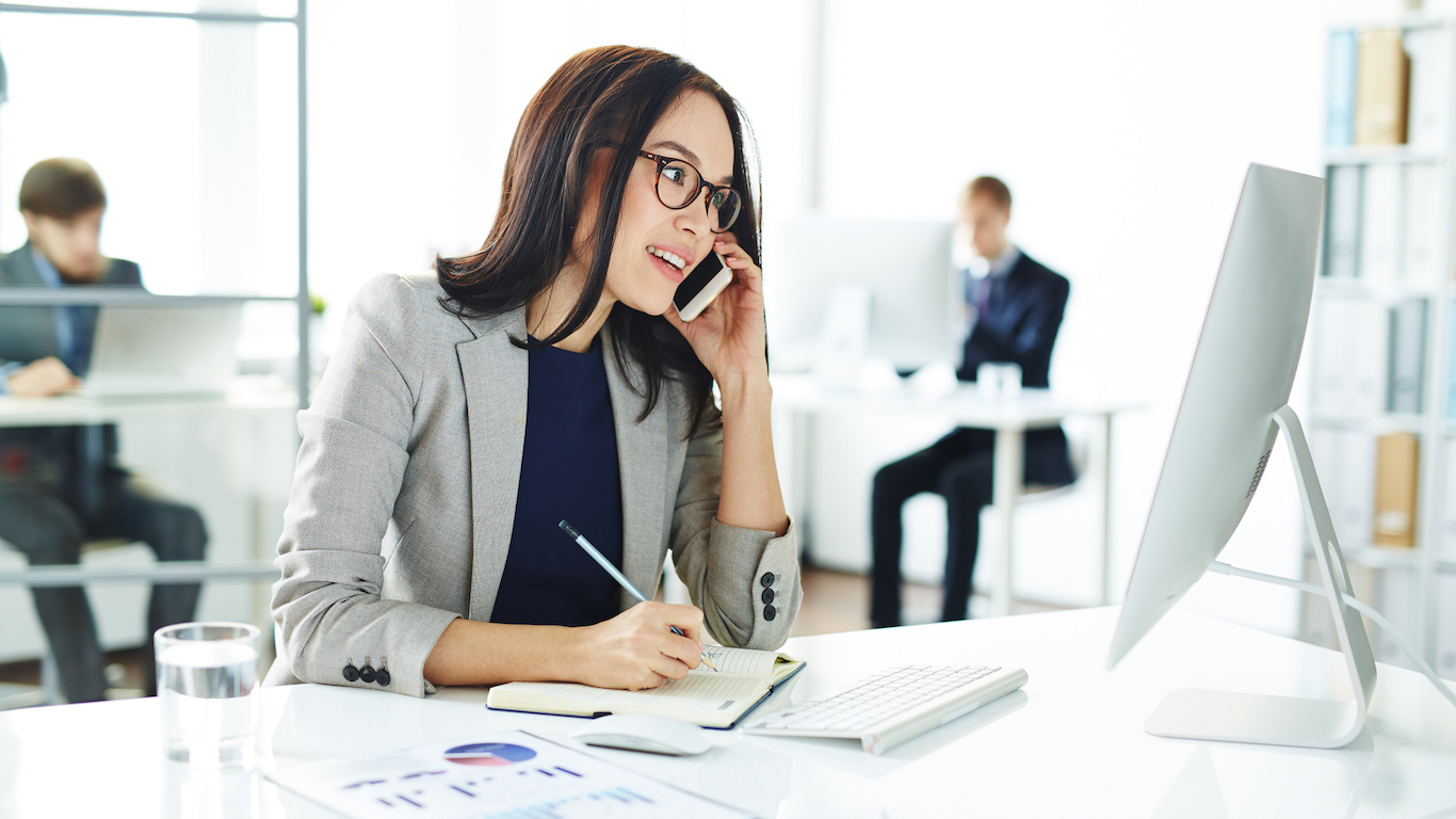 Business woman on phone, media buying agency