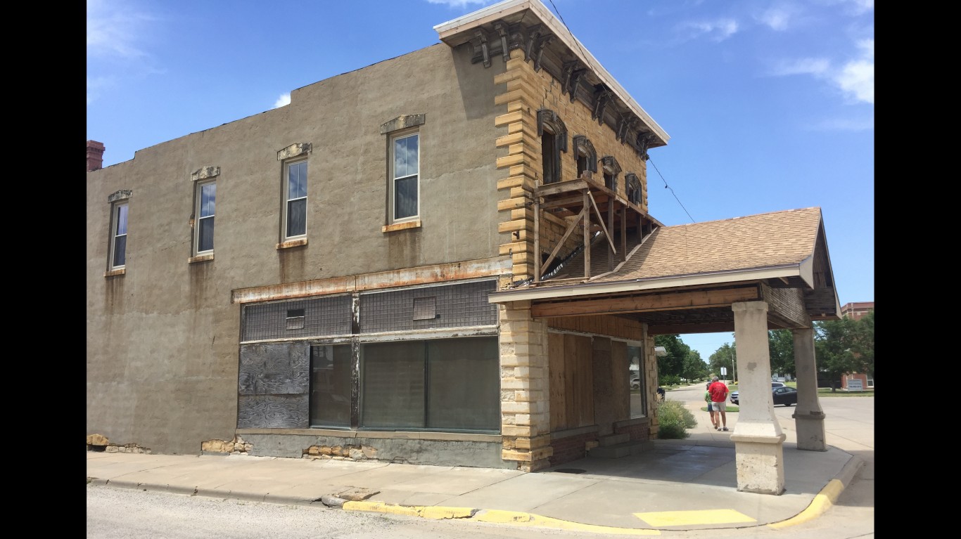 Former Oldsmobile Dealership by JOHN LLOYD