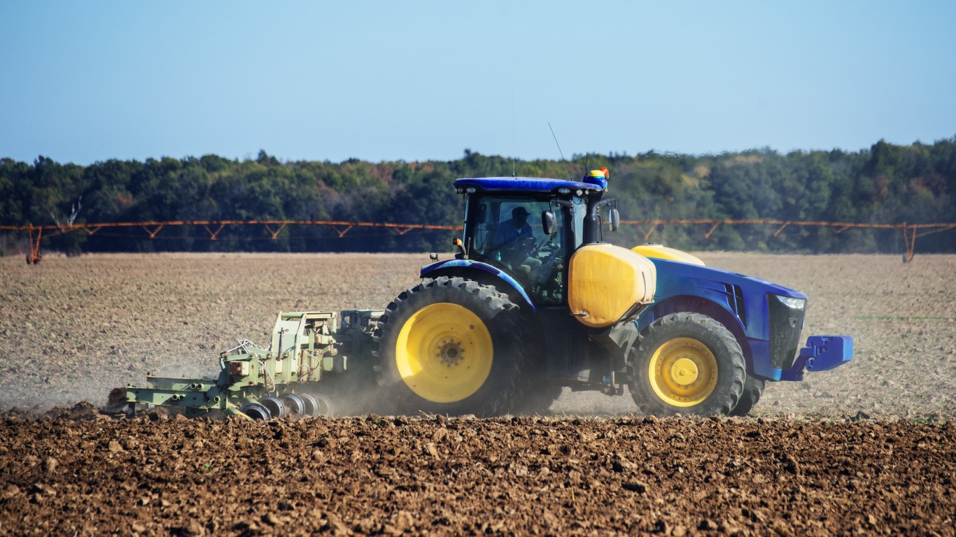 A tractor in Tunica County Mis... by Rawpixel Ltd