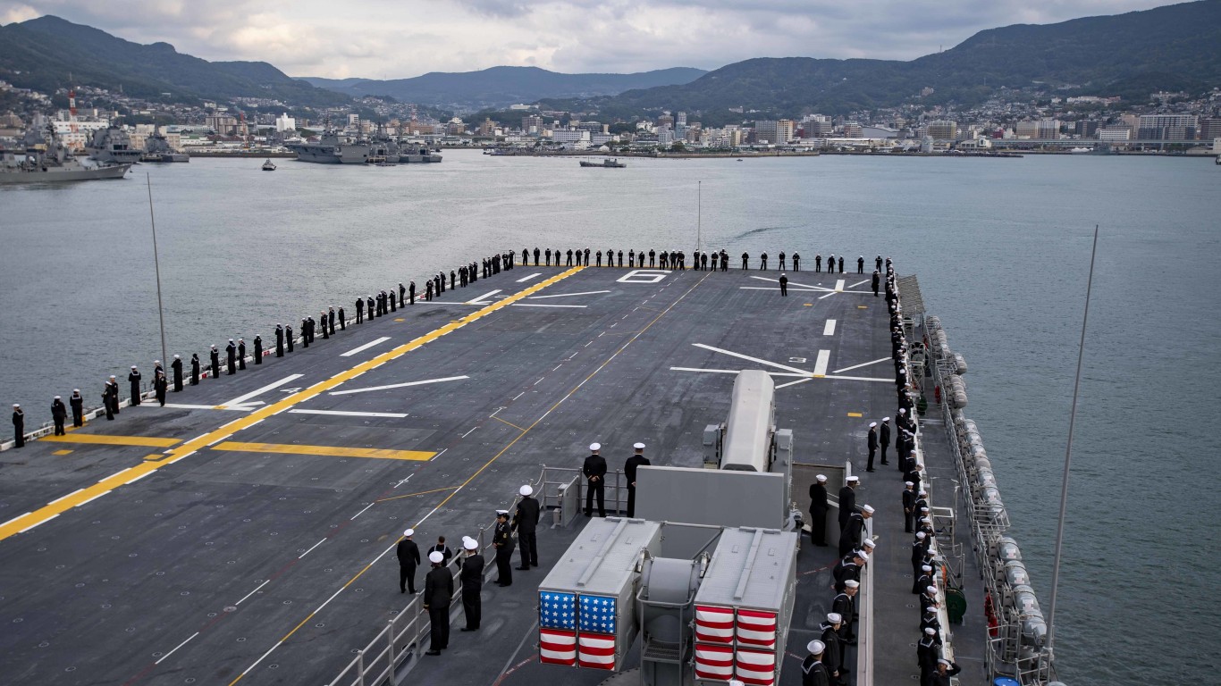 Sailors man the rails as the A... by Official U.S. Navy Page