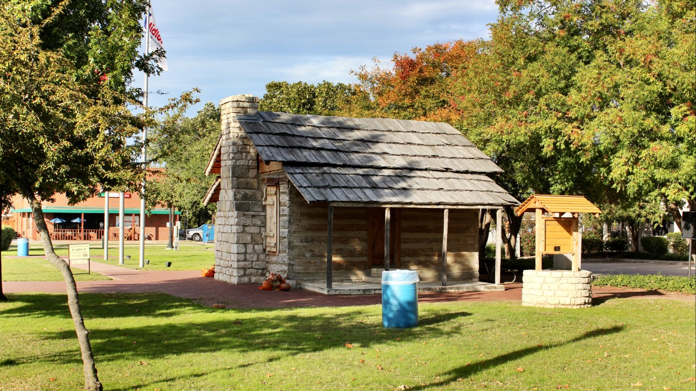 Log Cabin, Midlothian, Texas by Nicolas Henderson