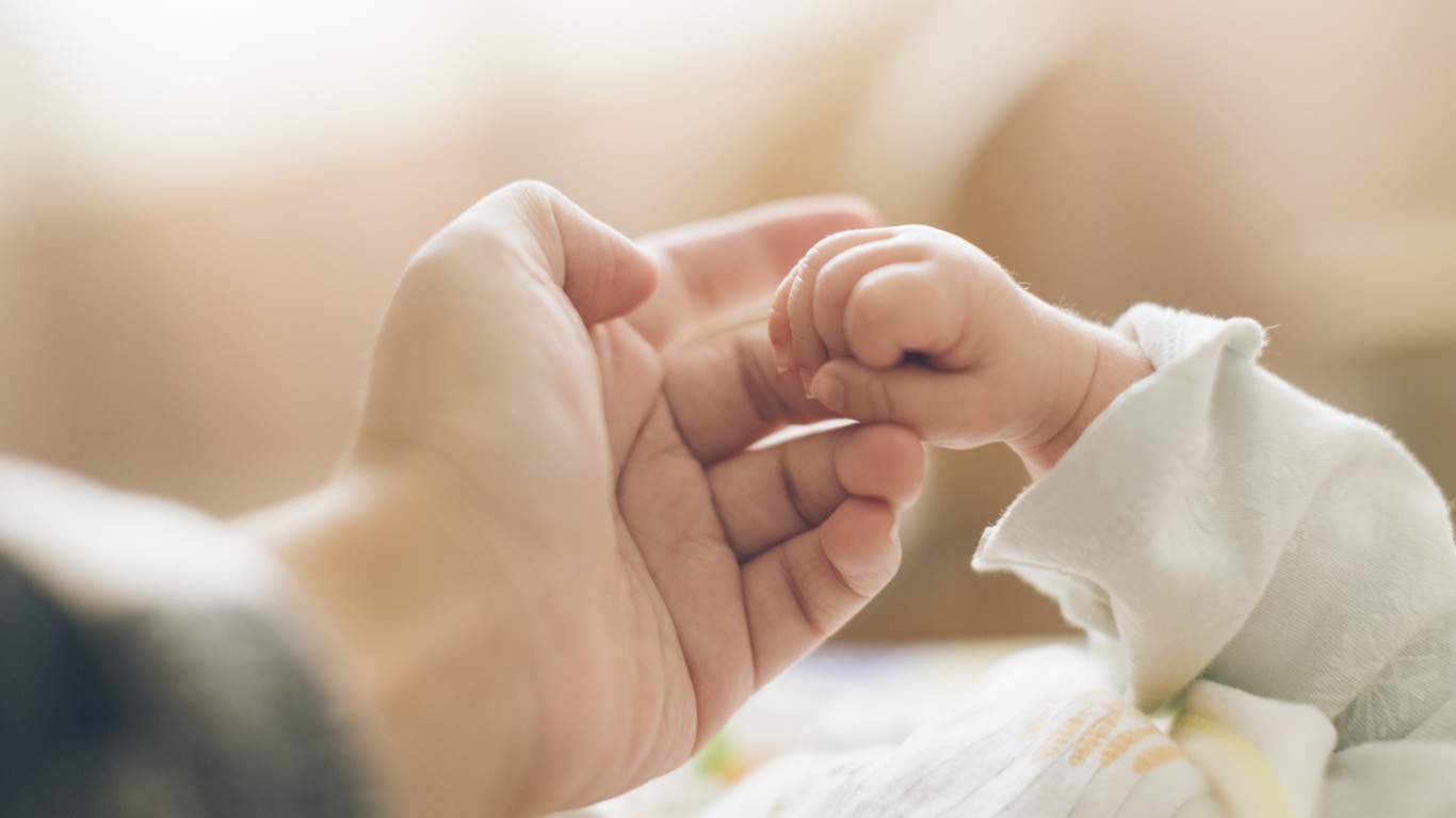 With a newborn and a nanny, we barely have time for family – can we afford to dial down while still growing our nest egg?
