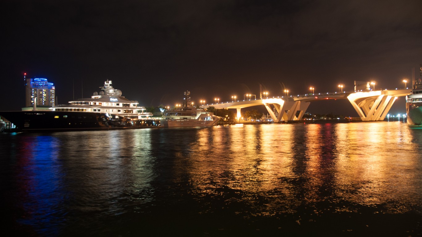 Yacht at night by Dave Herholz