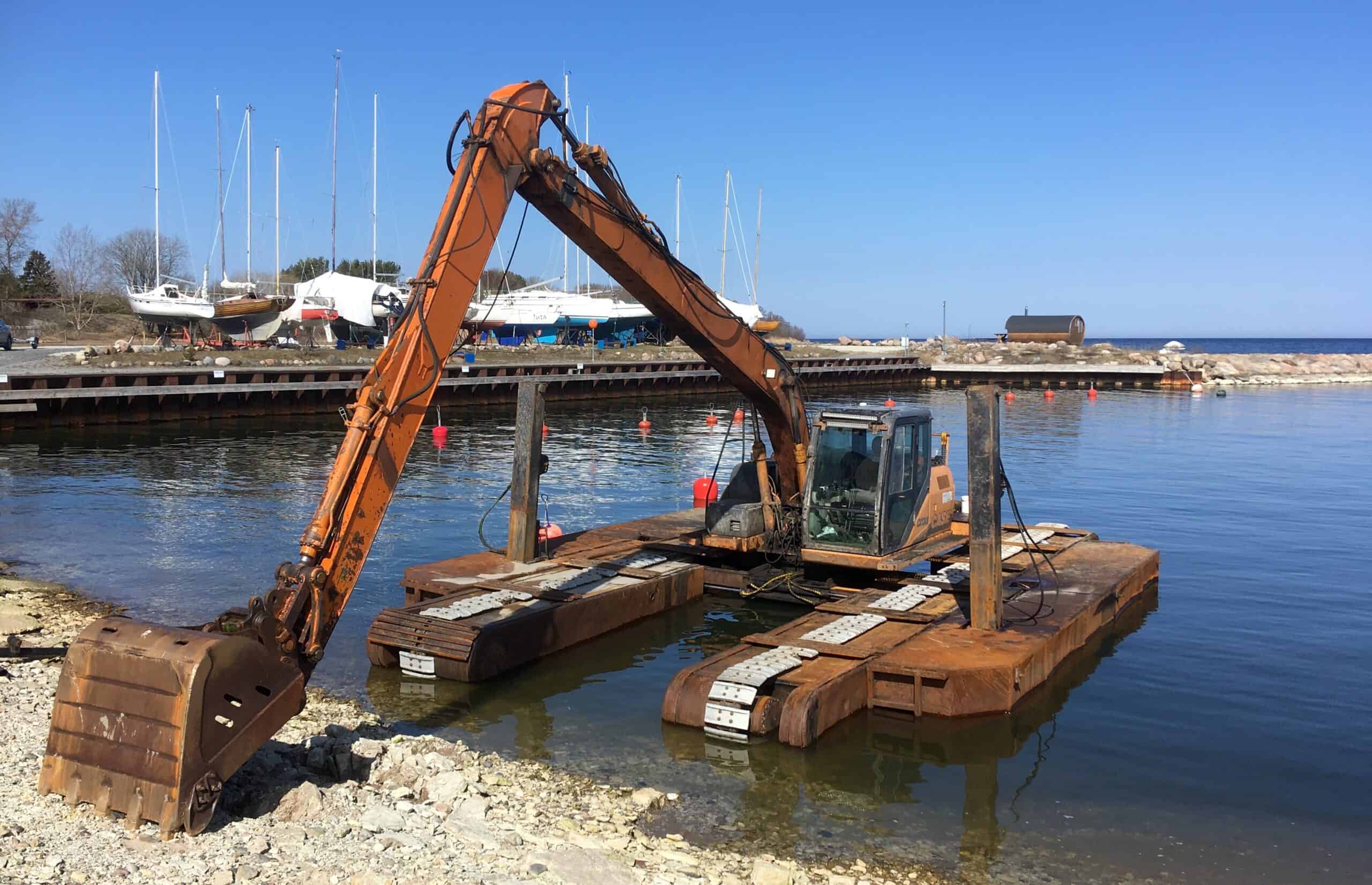 Excavator dredger in Neeme harbour, Estonia by Sillerkiil