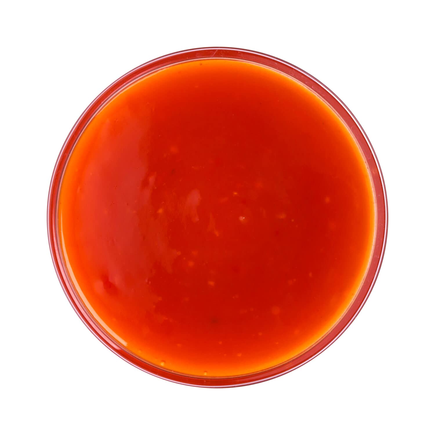 Hot chilli sauce in bowl isolated on white background. Top view