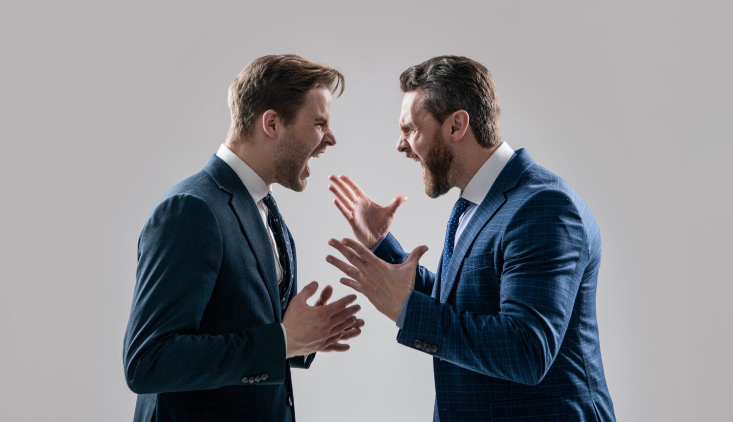 dissatisfied men discuss failure. two colleagues have disagreement and conflict. businessmen face to face. disrespect and contradiction. business partners blame each other. arguing businesspeople.