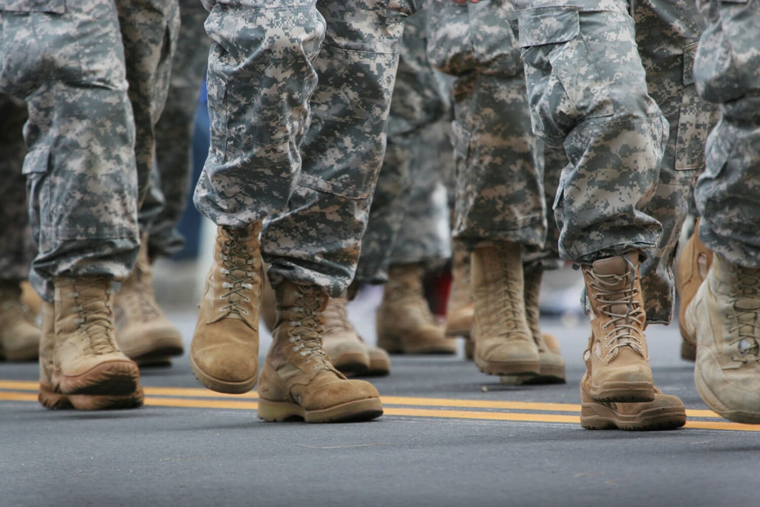 Soldiers dressed in army camouflage in an army parade