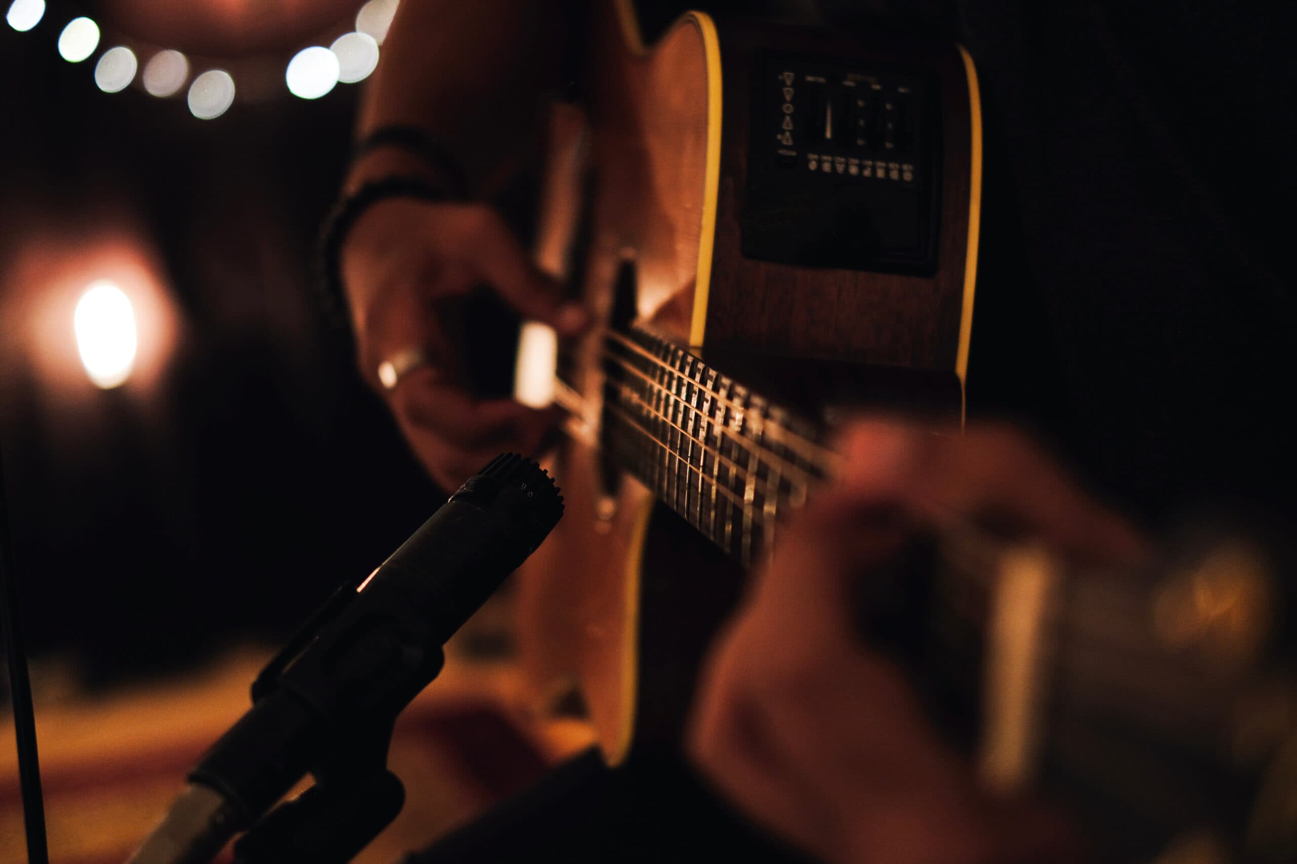 Man playing acoustic guitar