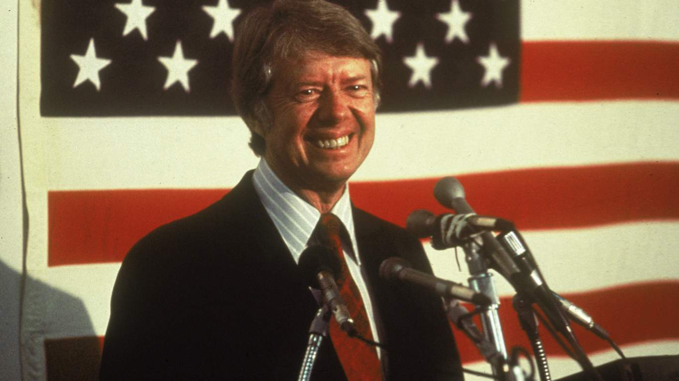 Jimmy Carter | Jimmy Carter In Front Of U.S. Flag