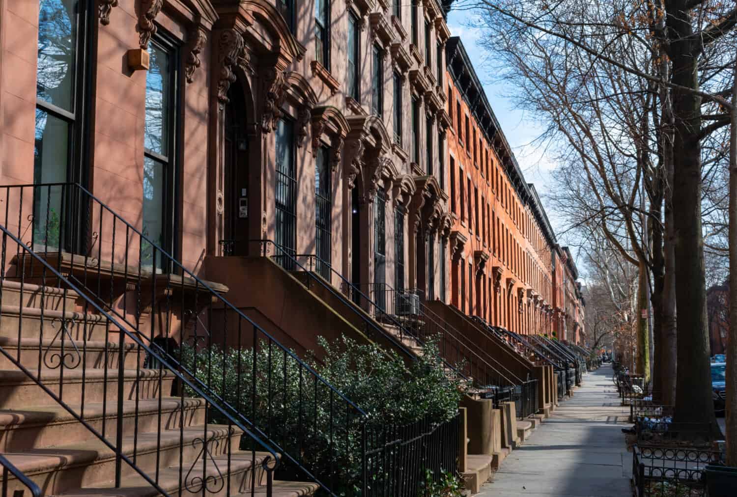 A Row of Old Colorful Brownstone Townhouses in Fort Greene Brooklyn New York