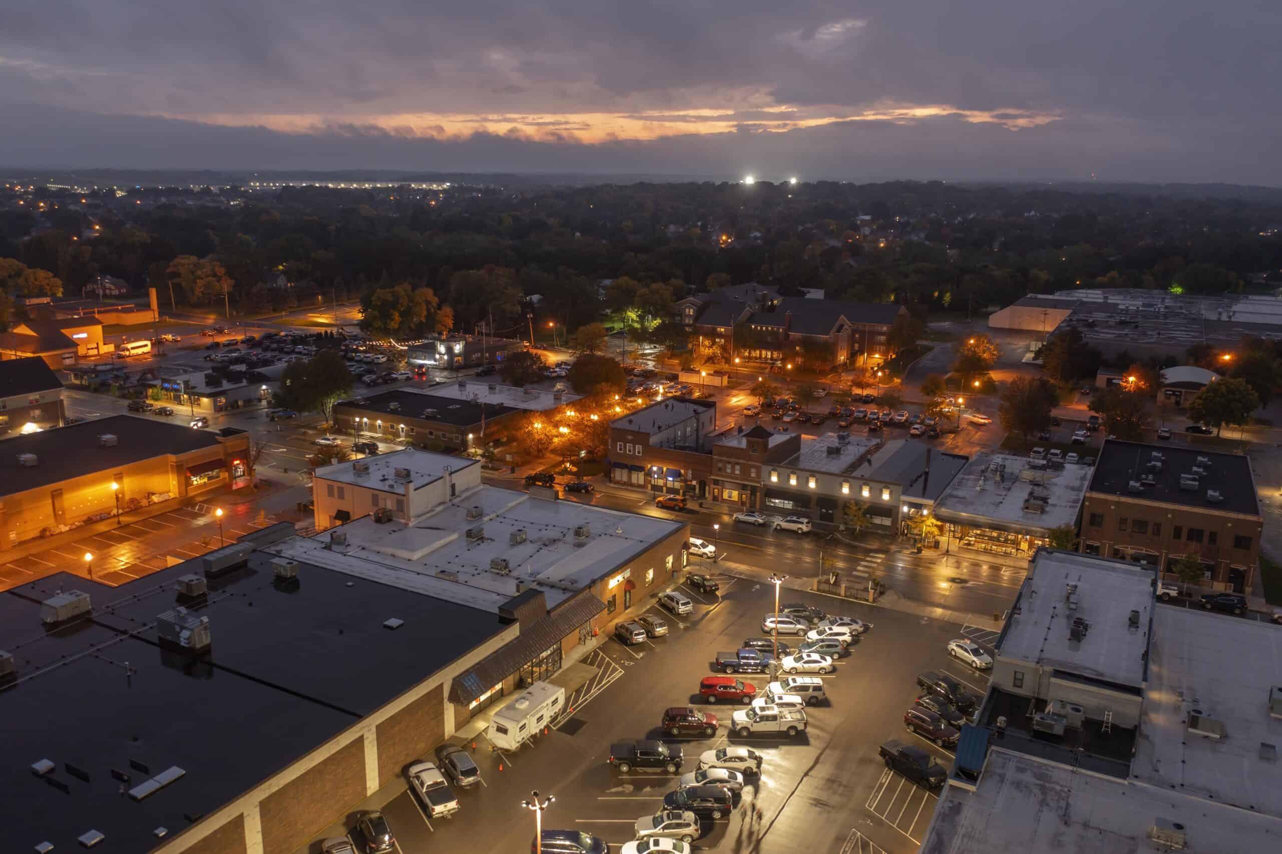 Lakeville, Minnesota | Aerial view of the Twin Cities Suburb of Lakeville with illuminated lights at night in Minnesota