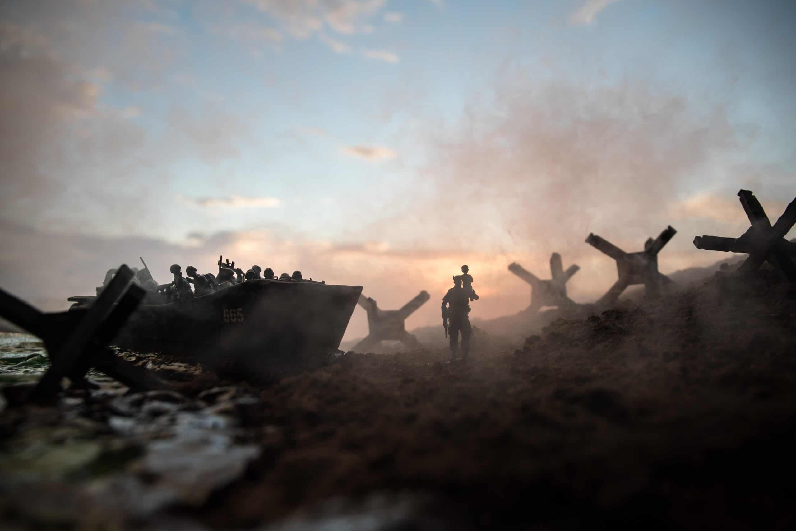 Operation Overlord (D-Day) | World War 2 reenactment (D-day). Creative decoration with toy soldiers, landing crafts and hedgehogs. Battle scene of Normandy landing on June 6, 1944.