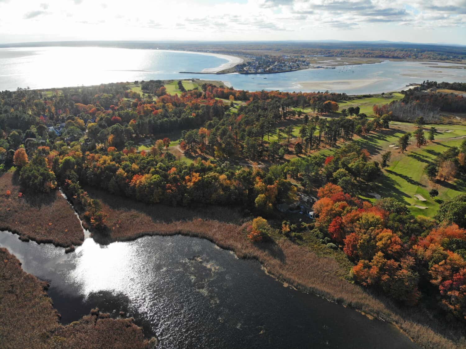 Aerial view of colorful autumn foliage over the Scarborough Beach State Park near Portland, Maine, United States