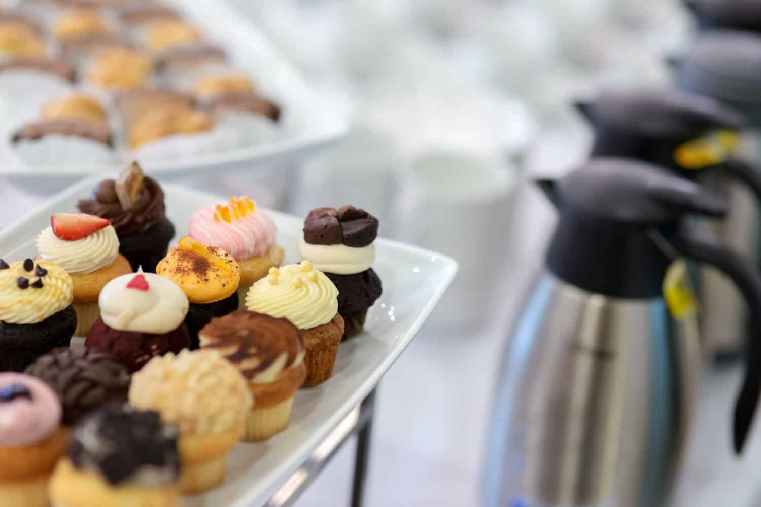 Mini dessert cupcake on white slate platter for tea break