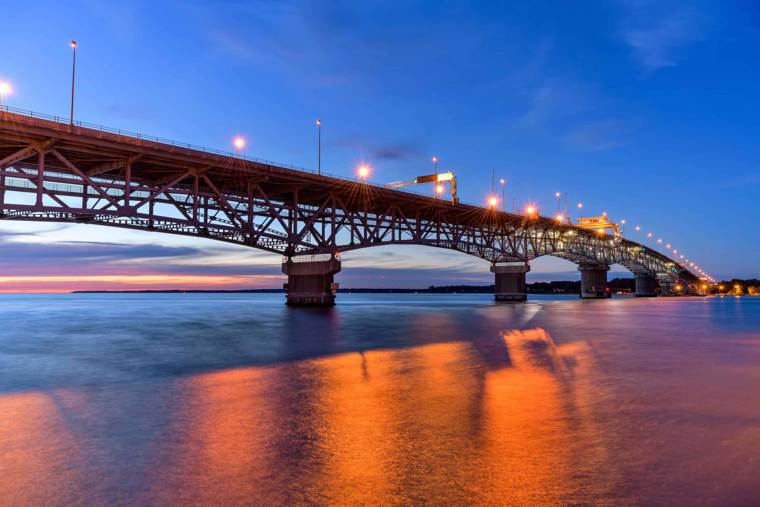 Gloucester Point, Virginia | Coleman Bridge - A Summer sunset view of George P. Coleman Memorial Bridge, the largest double-swing-span bridge in U.S., crossing over York River at Yorktown, Virginia, USA.