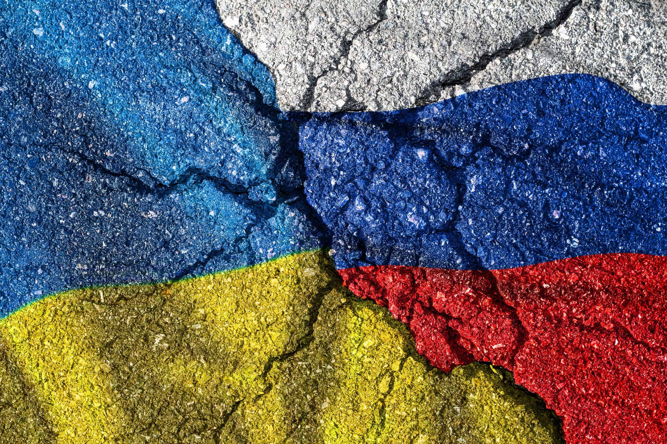 Russia ukraine | Ukraine and Russia flag with cracks, political conflict.