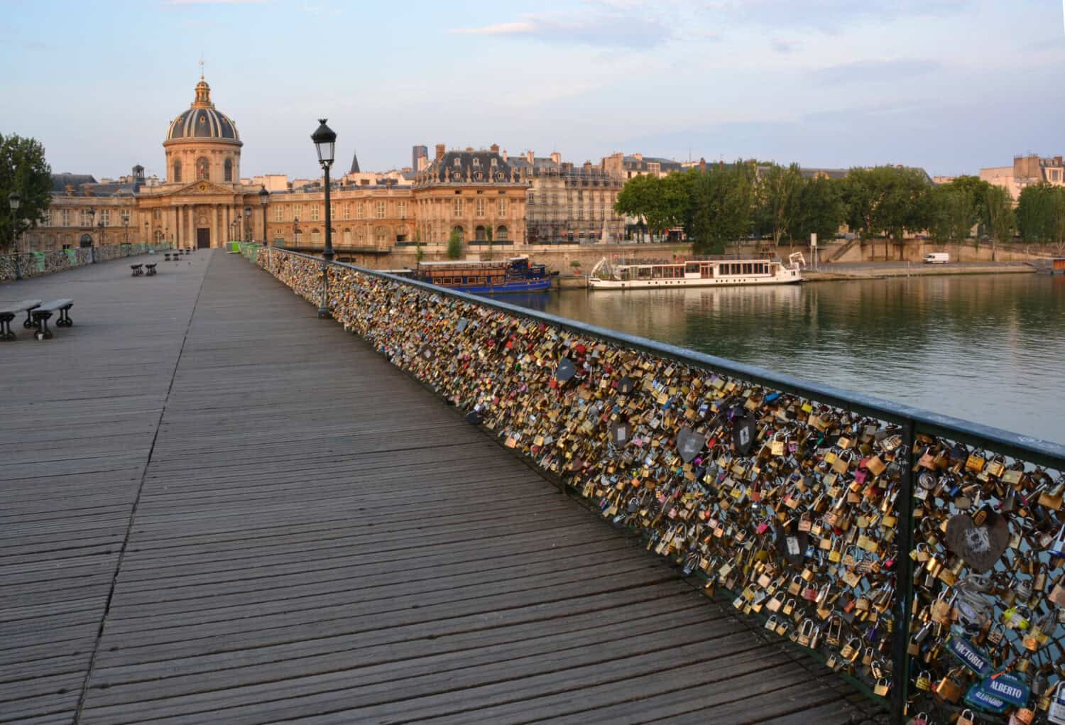 The hundreds of thousands of romantically love inscribed padlocks on the Pont Des Arts Bridge, Paris France.