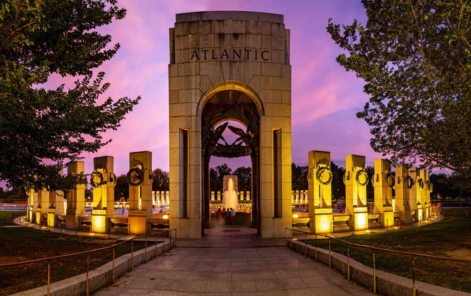 A Panorama of the Atlantic Pavilion of the World War II memorial in Washington DC in the evening.