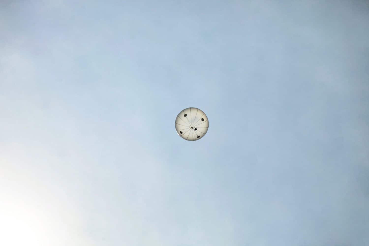 A weather balloon shoots of up into the upper atmosphere to read weather conditions