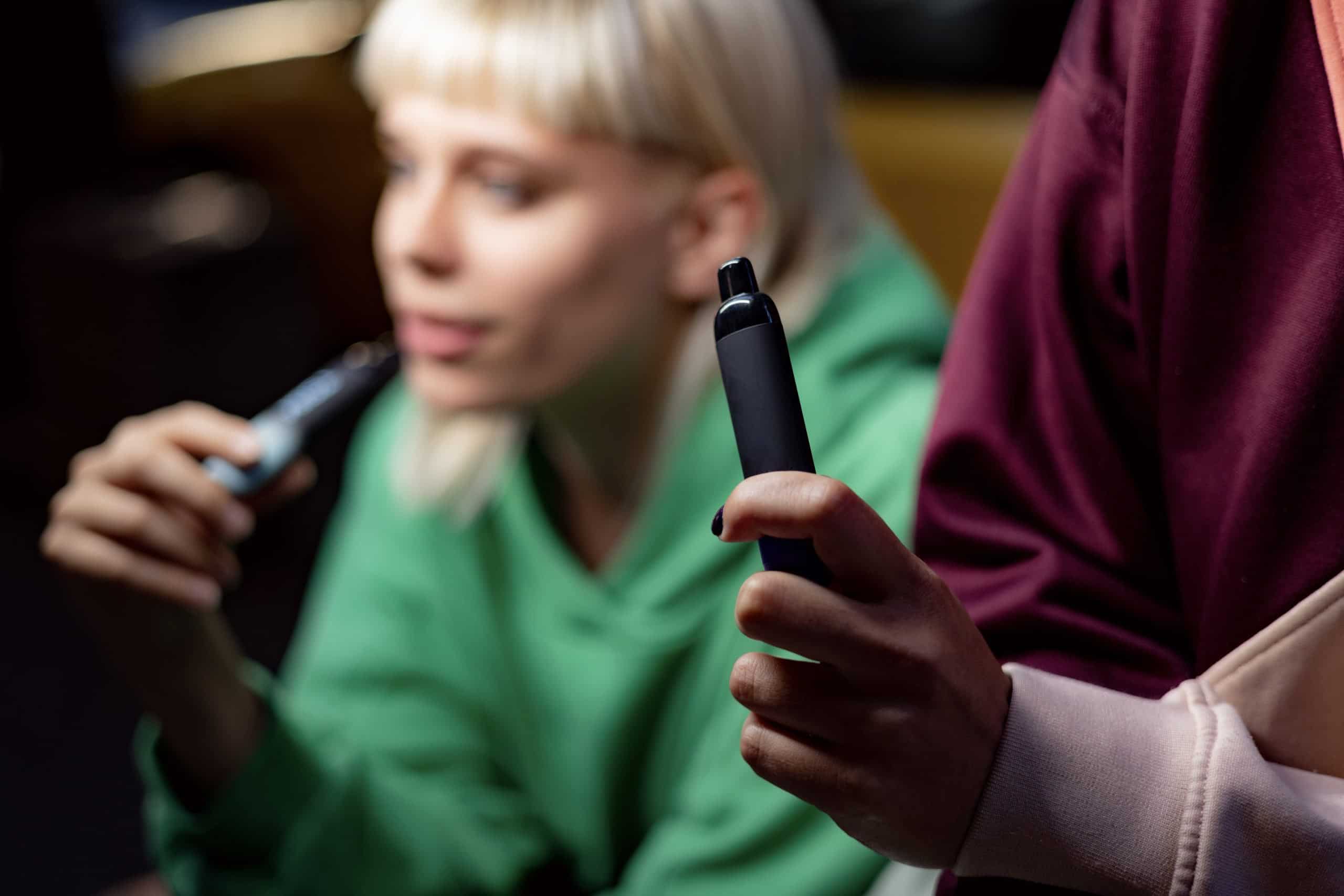 Close up of smoking a vape.