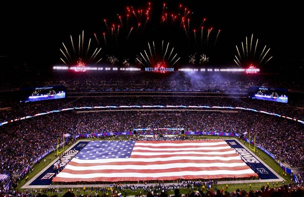 Marines, Sailors, Coast Guardsmen, Airmen and Soldiers unfurl American Flag at New York Giants military appreciation game Nov. 20 by NYCMarines