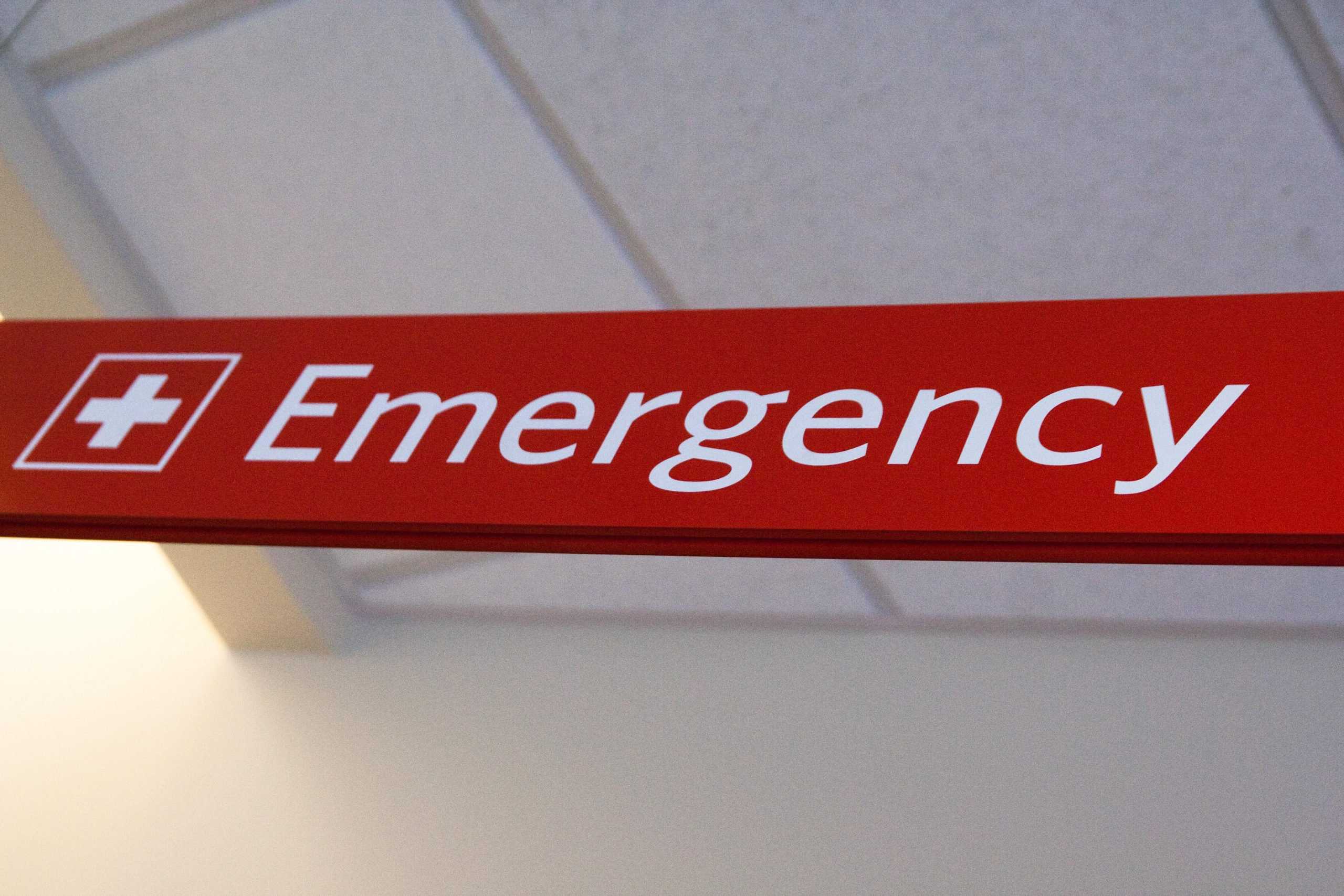 Michigan hospital emergency | Red Emergency Sign at Hospital