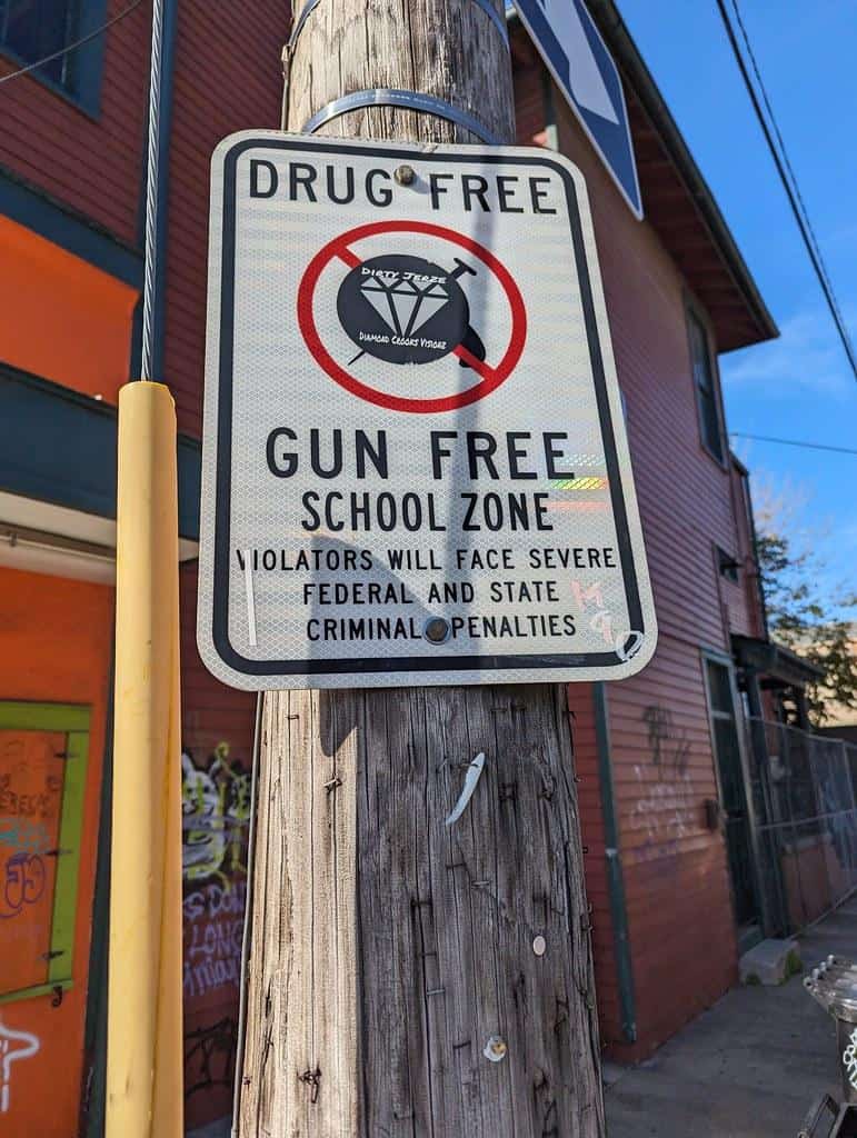 Drug Free Gun Gree School Zone sign, Canal Street, New Orleans, Louisiana, USA by gruntzooki