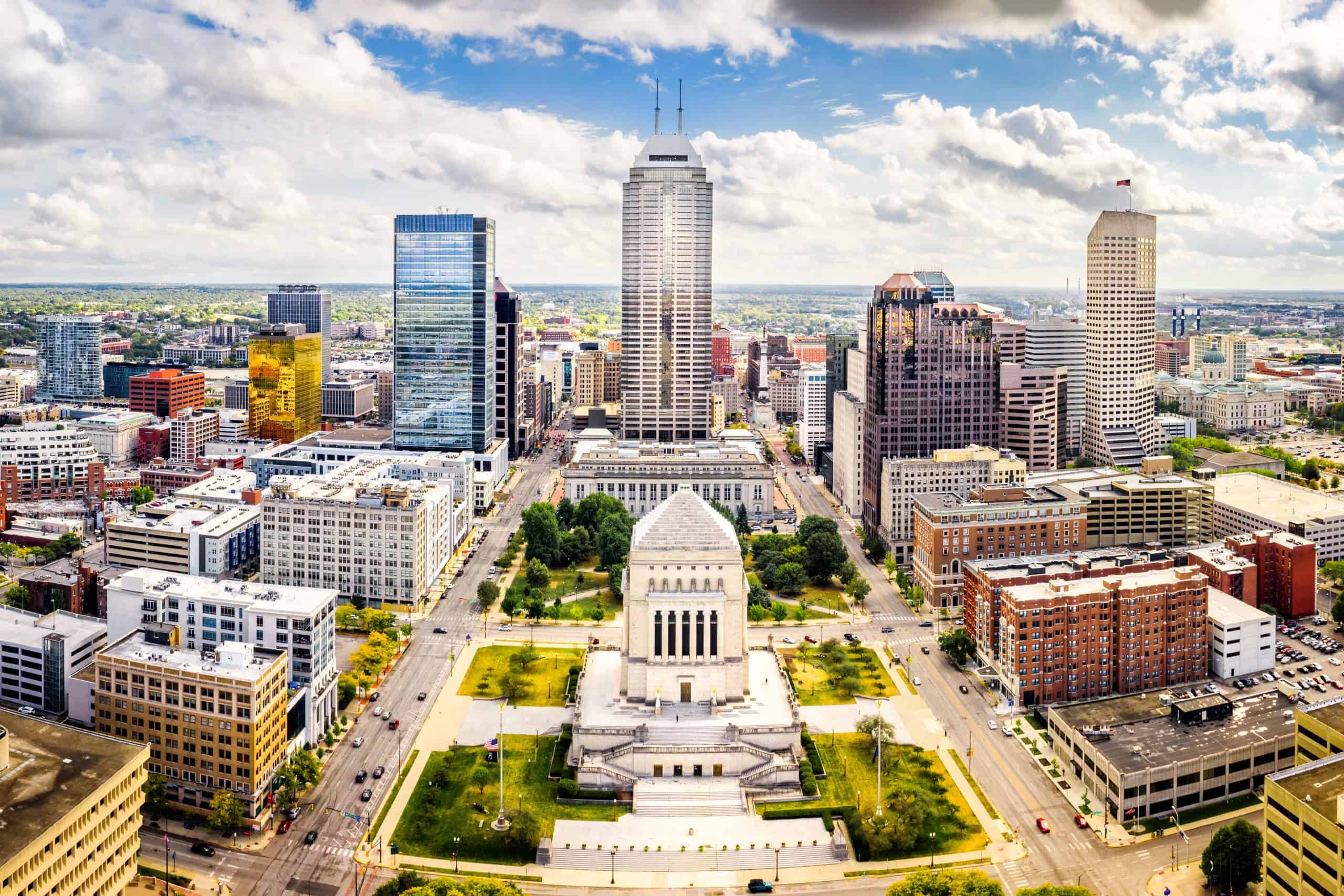 Indiana | Indiana Statehouse and Indianapolis skyline on a sunny afternoon.