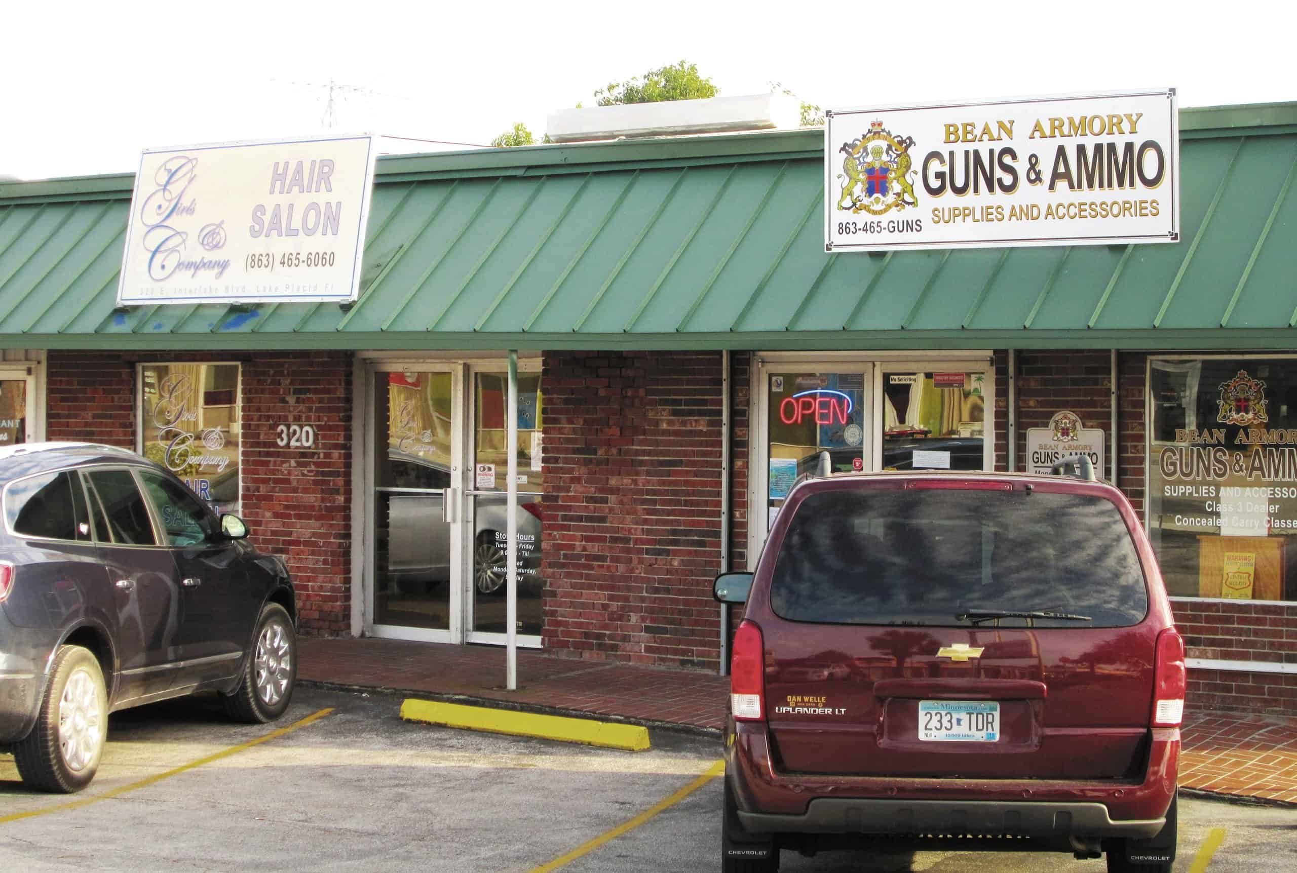 Guns &amp; ammo next to hair salon, Lake Placid, Florida by Beyond My Ken