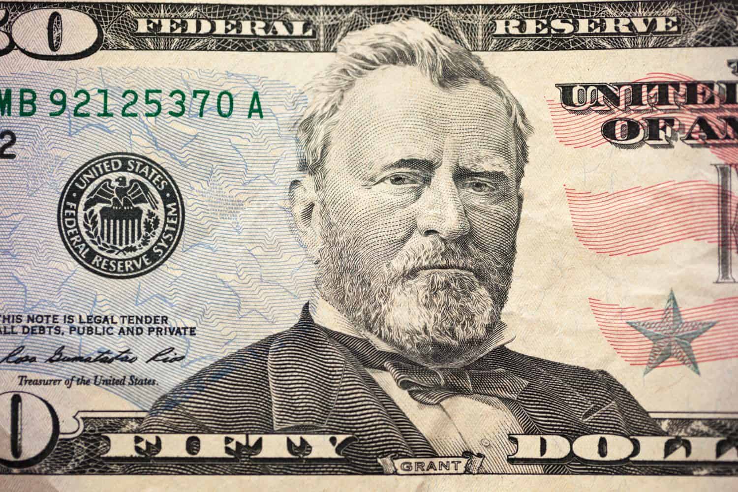 A U.S. fifty 50 Dollar Bill close up of Ulysses S. Grant. Highly detailed picture of American money. Portrait of Ulysses S. Grant on the fifty dollar banknote.