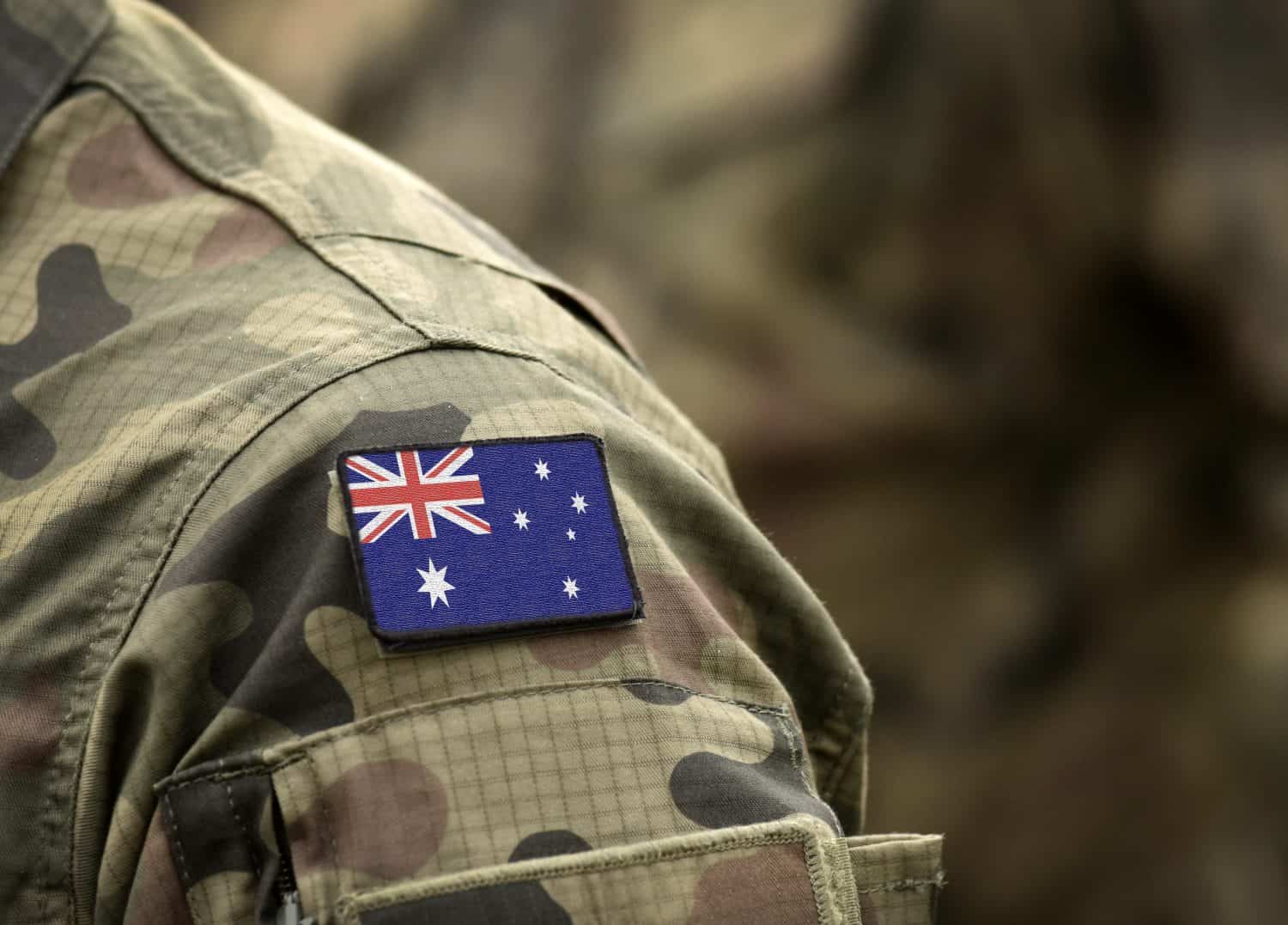 Flag of Australia on military uniform (collage). by Bumble Dee