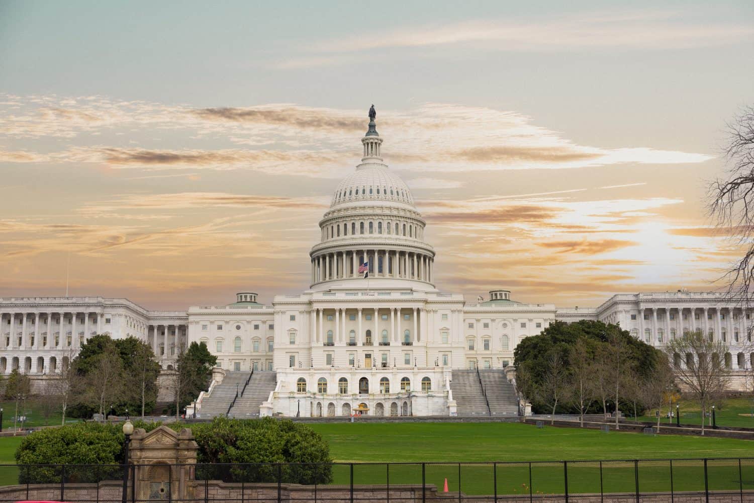 US Capitol Building in spring of 2021 with metal security fence