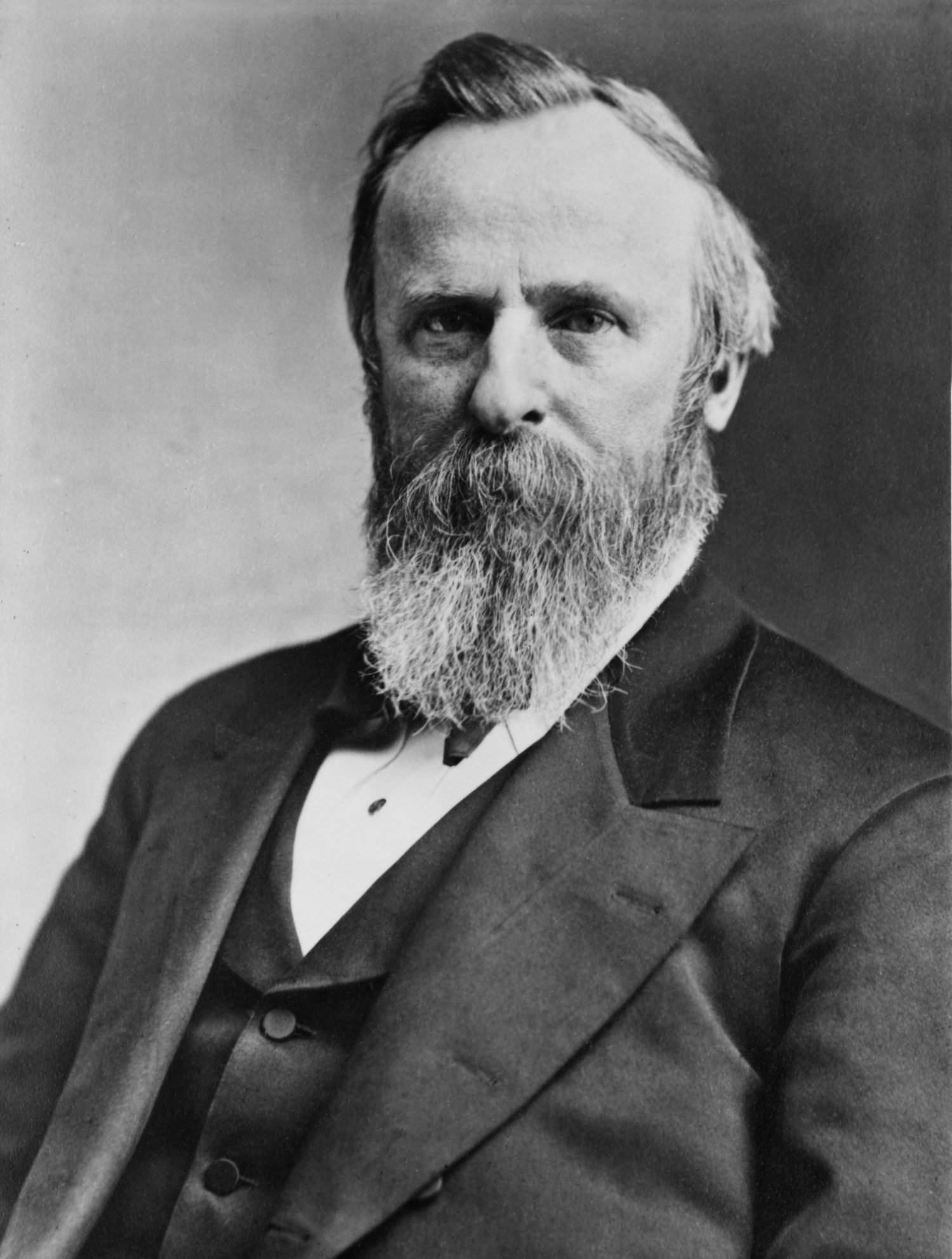 President Rutherford B. Hayes (1822-1893), elected in 1876, running against Democrat Samuel Tilden.