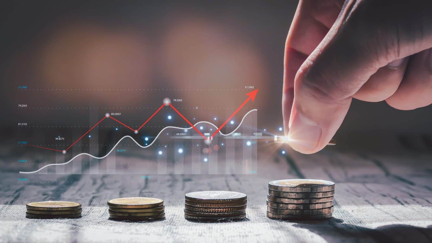 Money concept with man&#039;s hands placing money in a growing bank account. Business plan. Investment in stocks, dividends, currency exchange and interest.