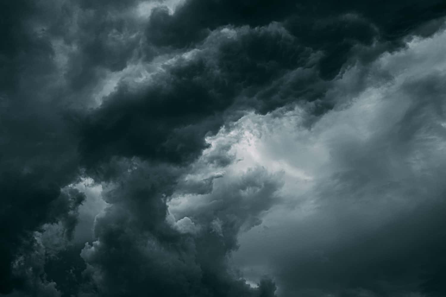 Cloudy Sky With Dark Storm Clouds During Rain. Natural Background With Rainclouds. natural weather background dark blue backdrop thunderstorm stormy sky. abstract-background-design, abstract