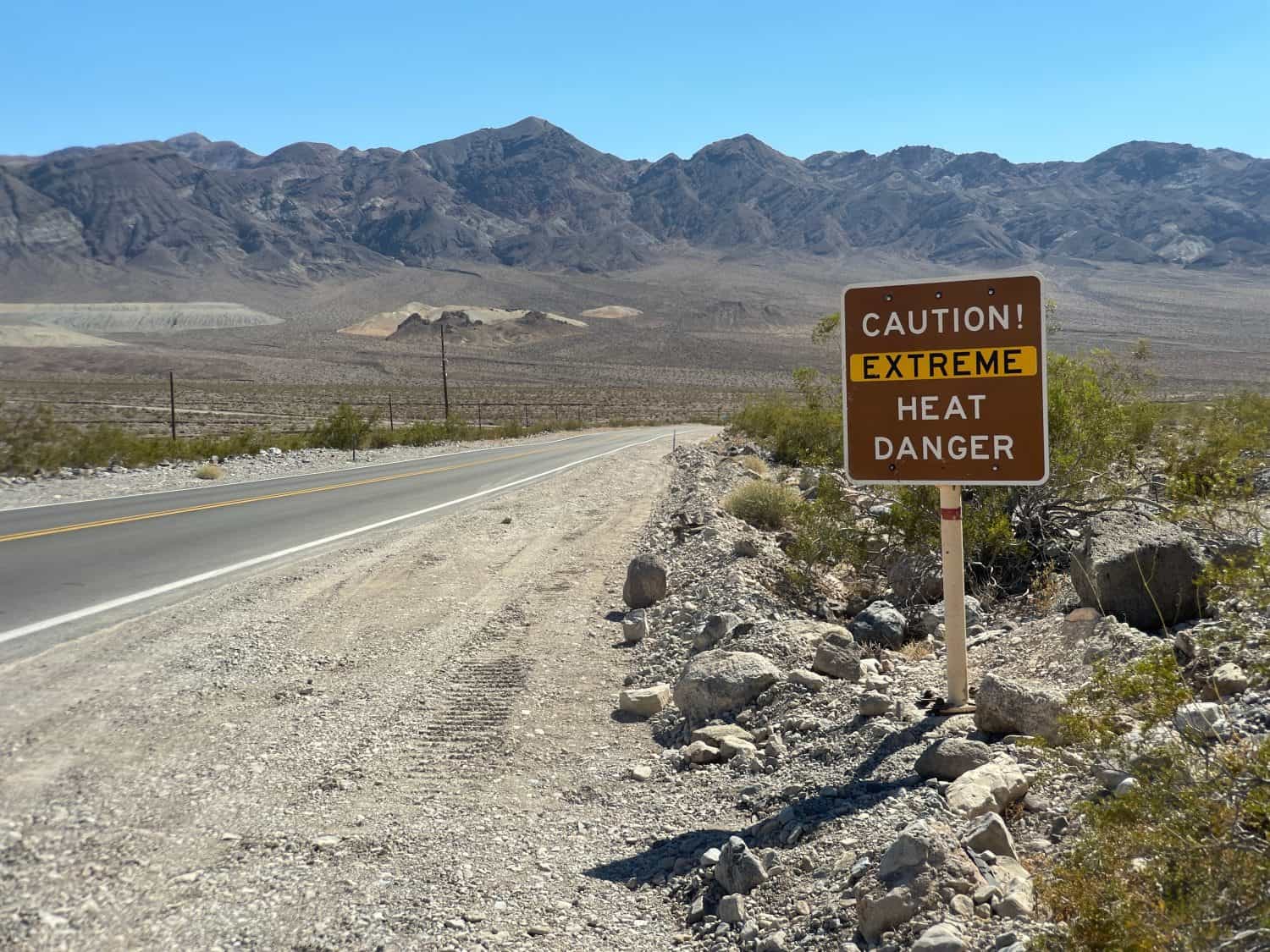 Caution Extreme Heat Danger Sign in Death Valley National Park near Furnace Creek California in July