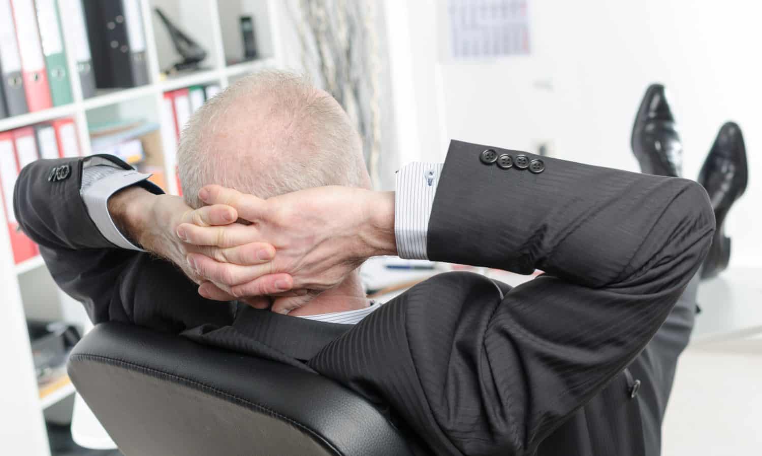 Relaxed businessman during a break at office