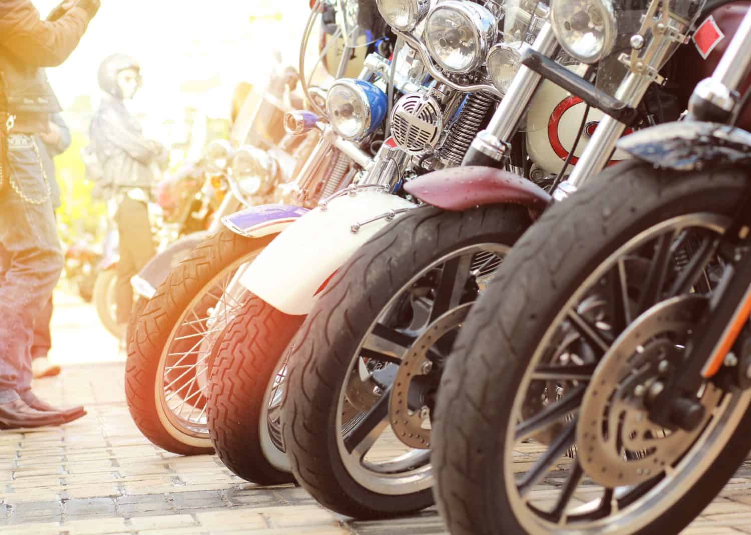 Row of vintage motorbikes close up sunset
