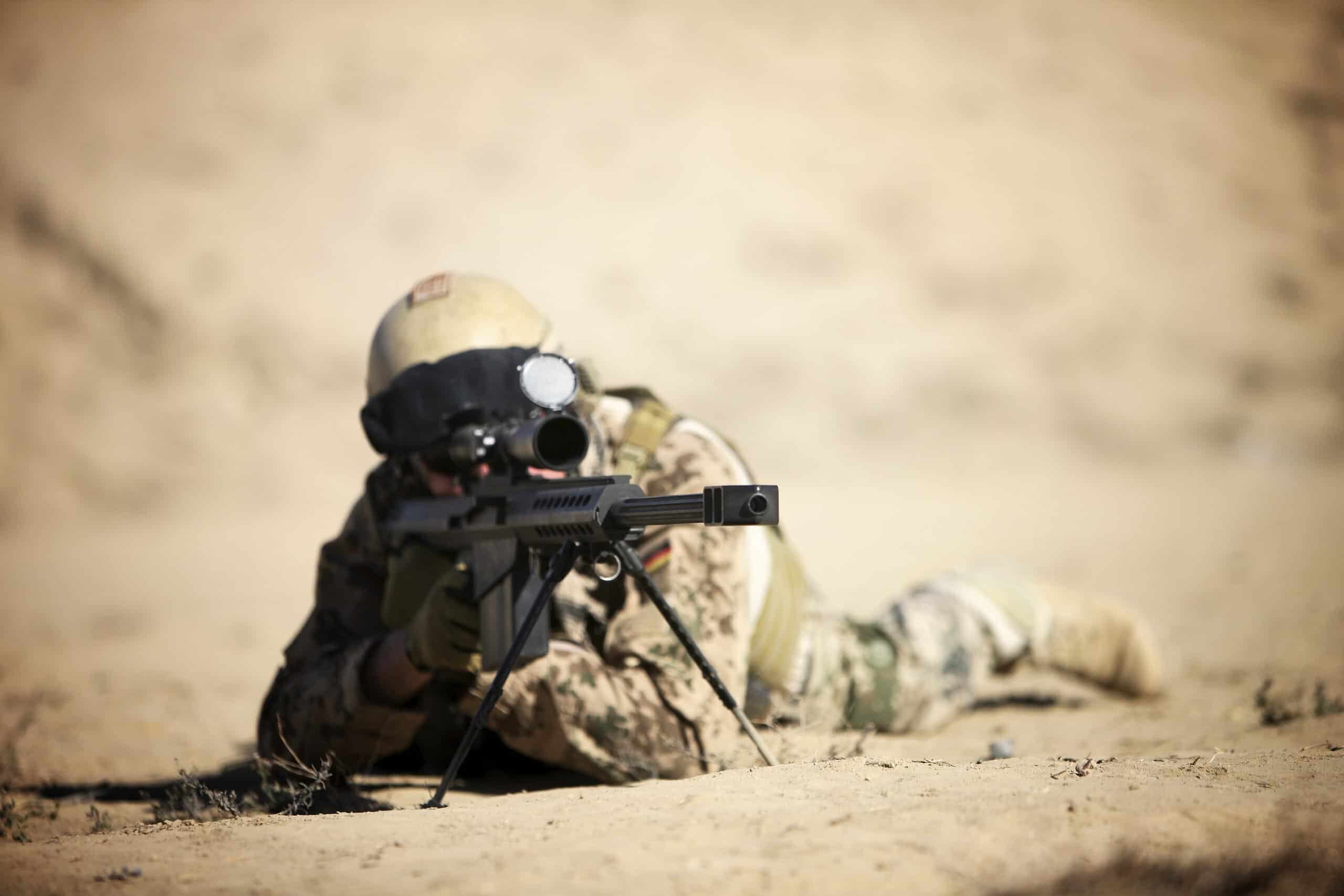 A German soldier sights in a Barrett M82A1 rifle on a range in Kunduz, Afghanistan.