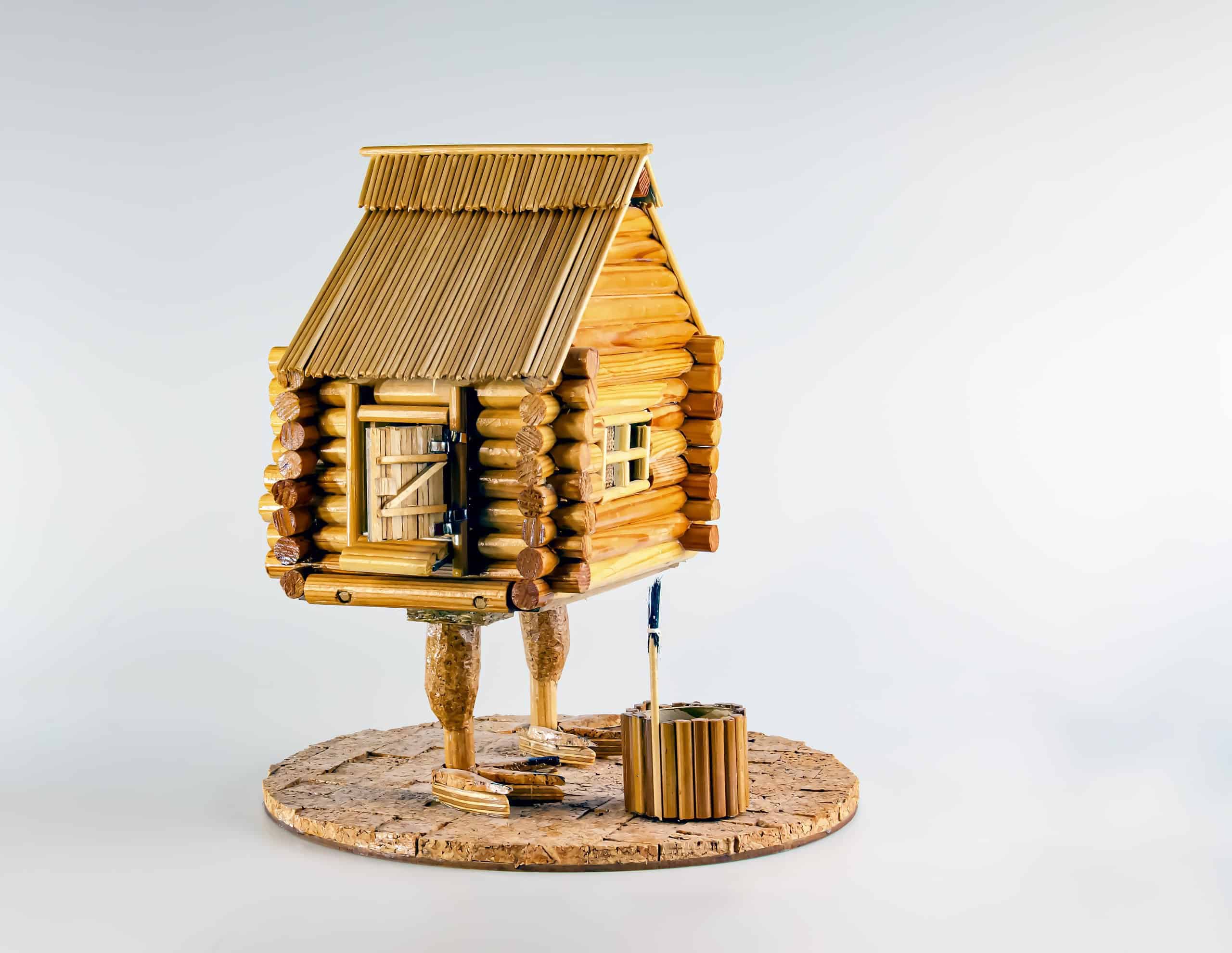 A figurine of a wooden house on chicken legs. Baba Yaga&#039;s house. Handmade.