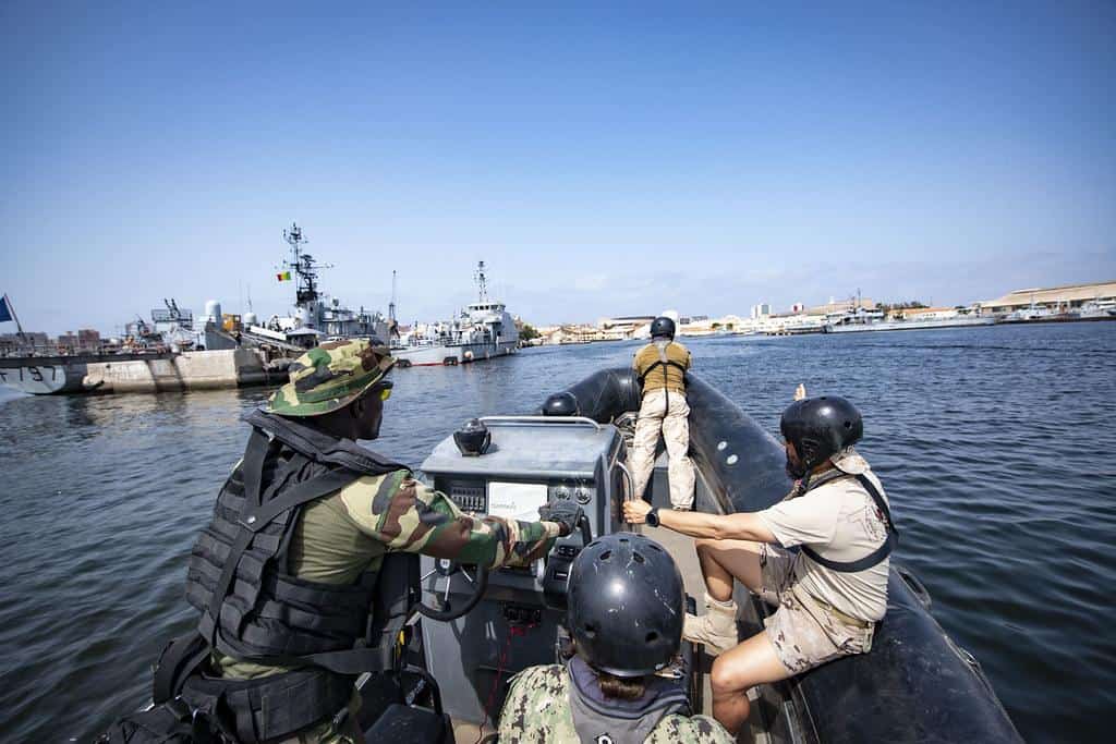 Senegalese, Portuguese, Spanish and U.S. service members conduct small boat exercises in the Gulf of Guinea by Official U.S. Navy Imagery