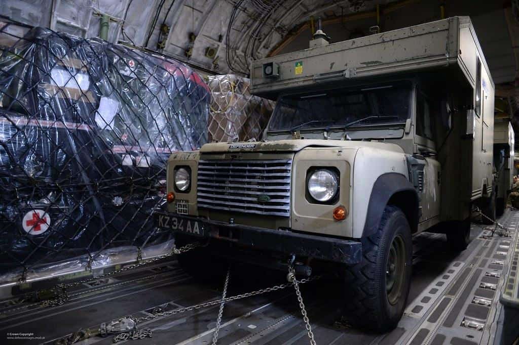 Army Ambulances on a RAF C17 Arriving in Sierra Leone by Defence Images