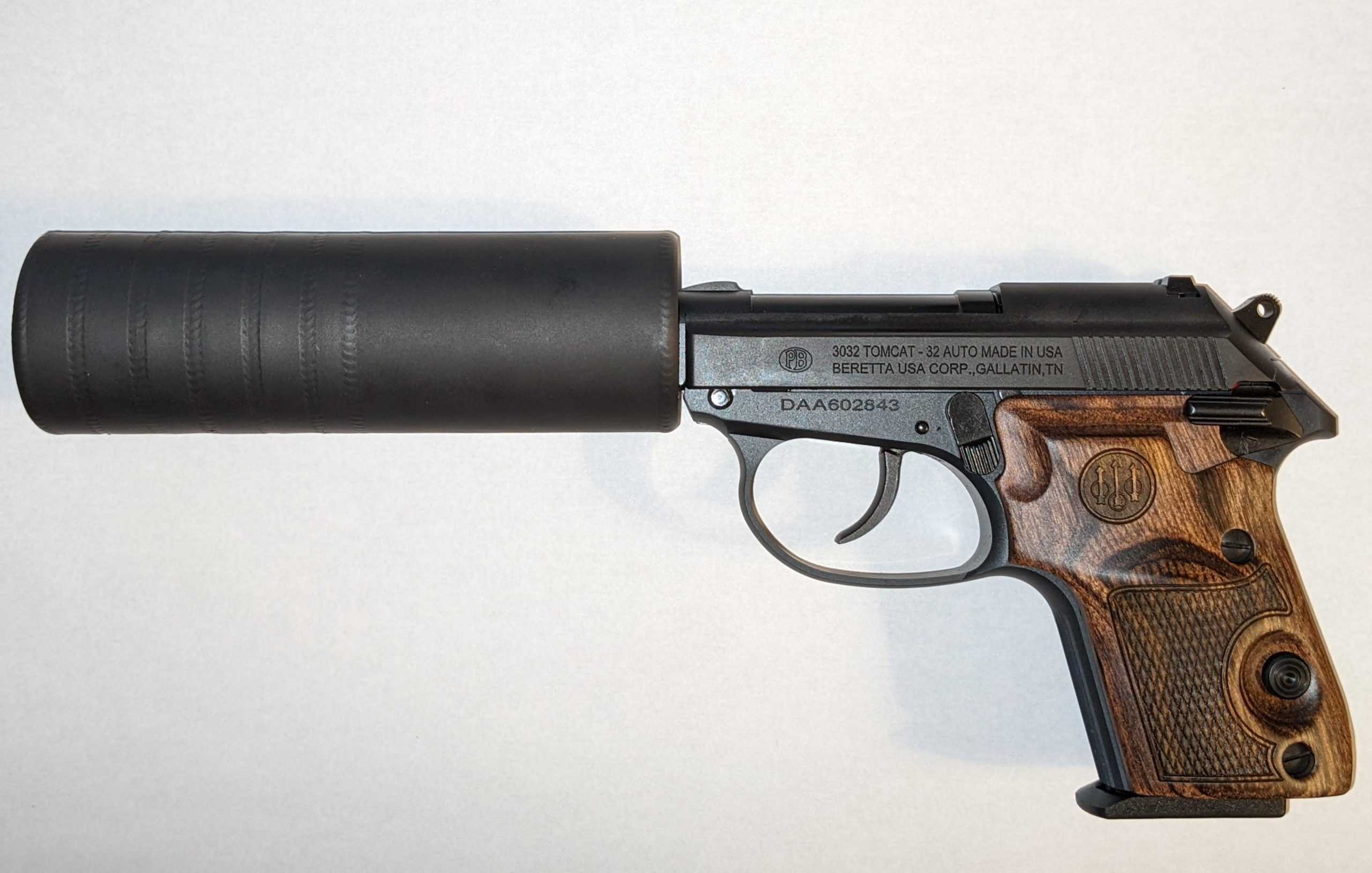 Beretta Tomcat .32 suppressed by DickClarkMises