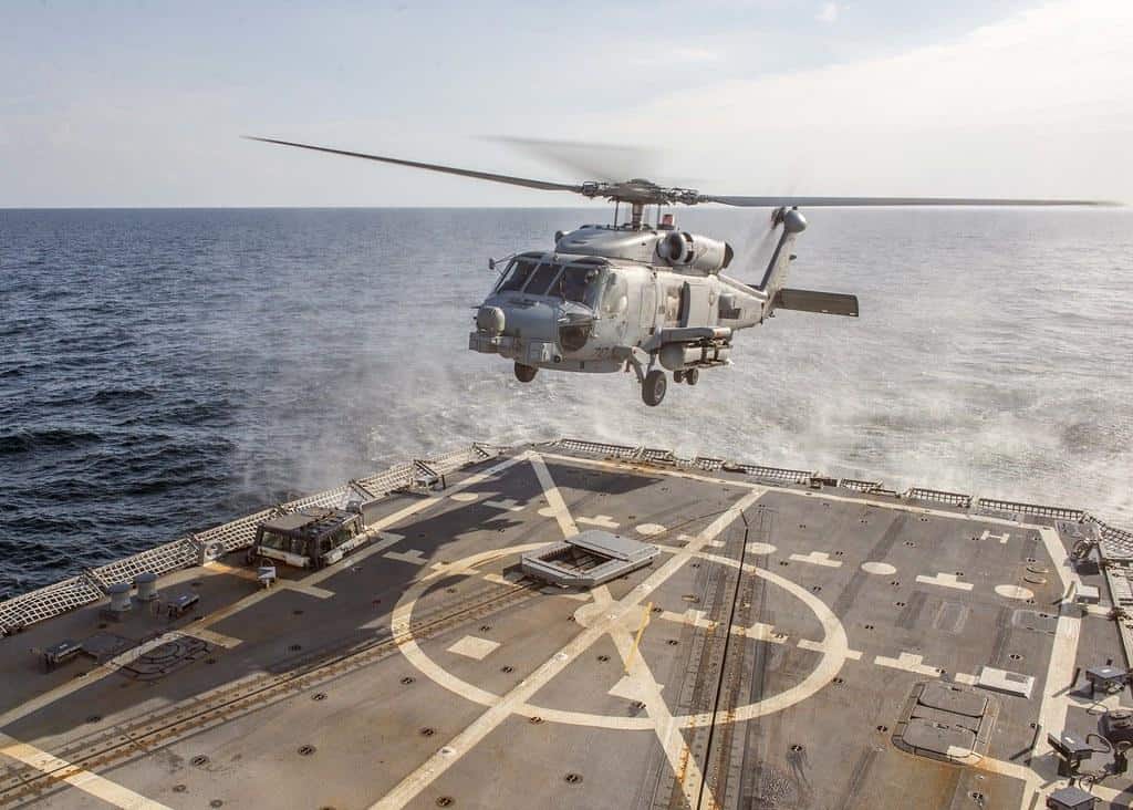 An MH-60R Sea Hawk helicopter lands aboard USS Bulkeley. by Official U.S. Navy Imagery