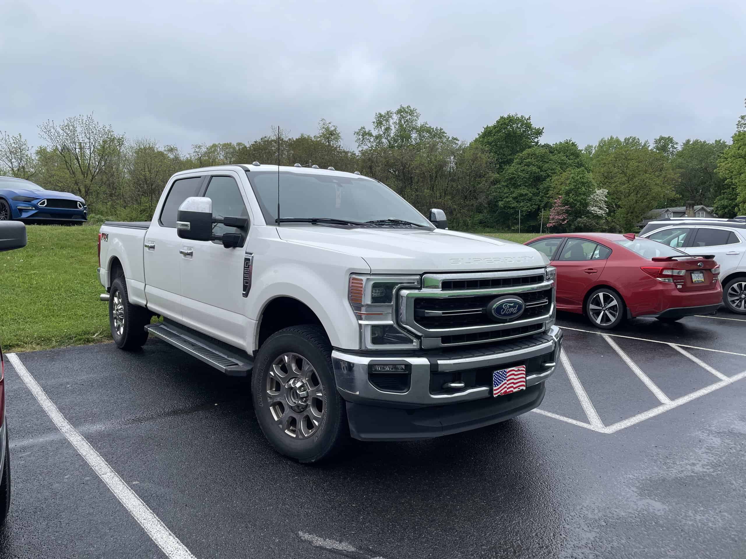 White Ford F-250 Super Duty, parking lot of Hoopla&#039;s Xtreme, Shamokin Dam, Pennsylvania, May 5 2024 by Deans Charbal